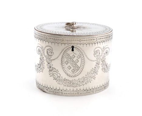 A George III silver tea caddy, by James Young, London 1783, oval form, flush hinged cover with a hinged finial, engraved Brig