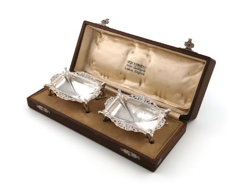 By Omar Ramsden, a pair of Arts and Crafts silver salt cellars / small dishes, London 1935, also engraved 'OMAR RAMSDEN ME FC