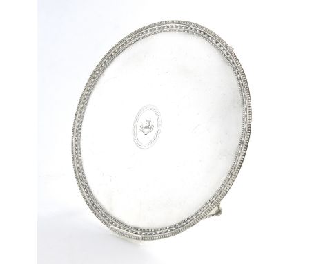 A George III silver salver, by Crouch and Hannam, London 1782, circular form, bead and husk border, the centre engraved with 