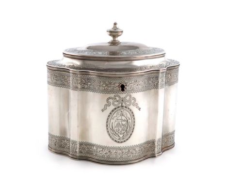 A George III silver tea caddy, by William Vincent, London 1786, shaped oval form, bright-cut foliate decoration, the hinged c