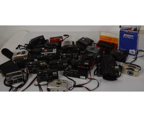 Selection of auto compact cameras, various film formats including 35mm, 110, and disc makes include Halina, Agfa Matic, Canon