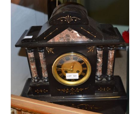 A black slate and marble mantel clock