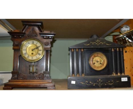 A black slate mantel clock plus another wooden example