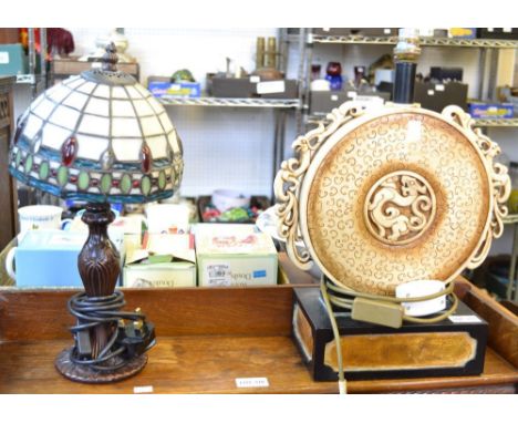 A Tiffany style table lamp with another Oriental style example