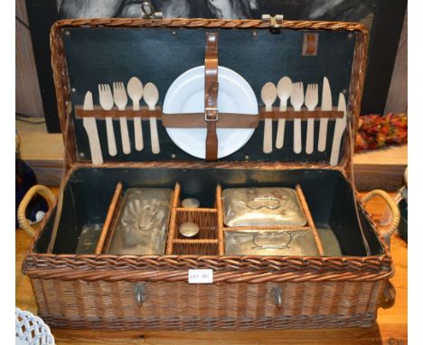 Retro picnic set housed in a fitted wicker hamper