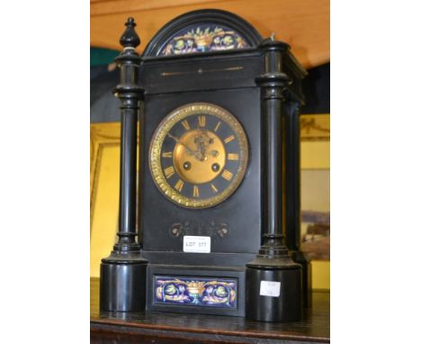 A black slate mantel clock