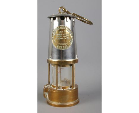 An Eccles 'Type 6' Miner's Safety Lamp; by The Protector Lamp and Lighting Co. Ltd.  