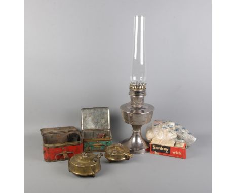 Two camping stoves, Primus 97 and Optimus 96, with original tins and accessories along with Alladin 21 oil lamp.  