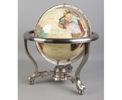 A modern gemstone globe, on chromed base, comprising of countries being composed of minerals and semi-precious stones. With c