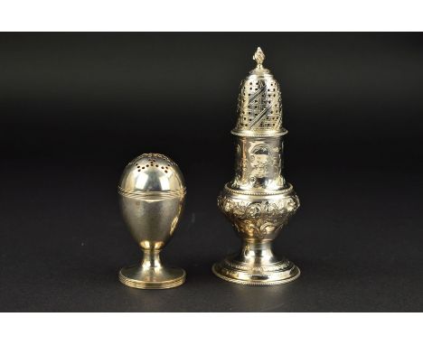 A GEORGE III SILVER PEPPERETTE, of ovoid form, pull off cover, gilt interior, engraved initials, concentric band decoration w