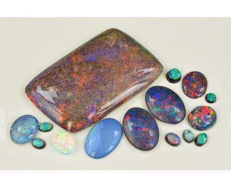 A MIXED COLLECTION OF OPAL DOUBLETS, SYNTHETICS AND SUGAR ACID TREATED STONES AND SPECIMENS