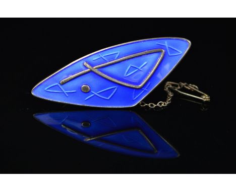 A NORWEGIAN ENAMEL BROOCH BY O.F. HJORTDAHL, of curved triangular outline with applied line and dot detail to the blue enamel