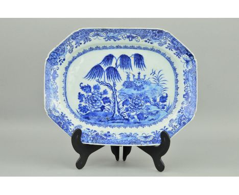 A CHINESE EXPORT BLUE AND WHITE MEAT DISH, Qianlong period, octagonal shape, painted with a landscape, butterfly and scroll b