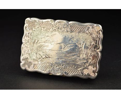 A VICTORIAN SILVER SNUFF BOX, of wavy rectangular outline, the hinged cover engraved with a duck flying over tree lined water