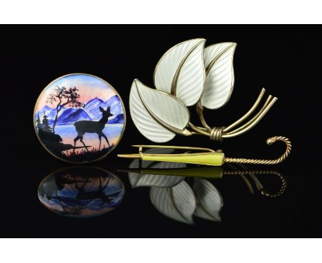 THREE NORWEGIAN ENAMEL BROOCHES BY HANS MYHRE, the first of circular outline depicting a deer in an outdoor scene, the second