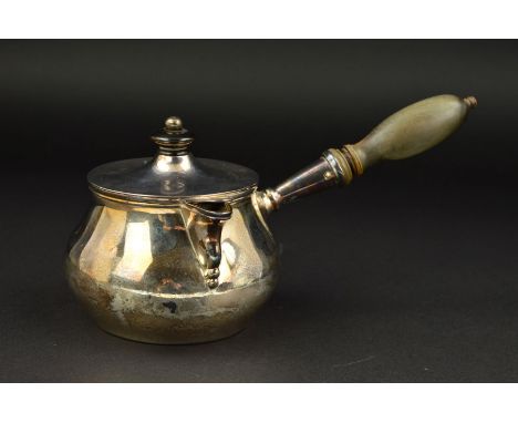 AN INDIAN COLONIAL SILVER BRANDY SAUCEPAN AND COVER, turned wooden finial and handle, hinged spout, extensive soldered repair