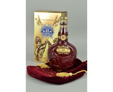 A RUBY PORCELAIN FLAGON CONTAINING CHIVAS BROTHERS ROYAL SALUTE, 21 year old blended Scotch Whisky, the flagon is presented i