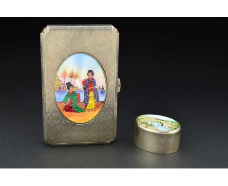 A CONTINENTAL SILVER AND ENAMEL CIGARETTE CASE, of canted rectangular form, engine turned decoration with oval enamel panel o