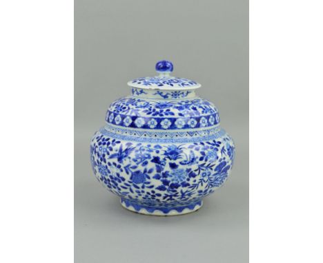 A CHINESE BLUE AND WHITE PORCELAIN JAR AND COVER, of double shouldered form, the circular cover with bun shaped finial, decor