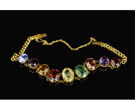 A MID 20TH CENTURY MULTI GEMSTONE GOLD BRACELET, oval mixed cut gemstones graduating in size from 8.0mm x 7mm to 12.0mm x 8.0