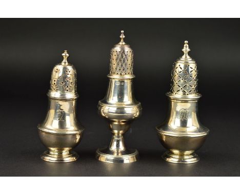 A GEORGE III SILVER CASTER, of baluster form, knopped finial above domed pull off cover with lozenge engraved decoration, the