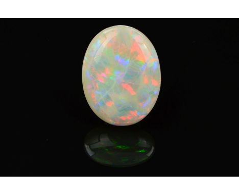 A LARGE OVAL SHALLOW CABOCHON CUT OPAL STONE, measuring 28mm x 21.8mm, weighing 26.87ct, grey base colour with rolling flash 