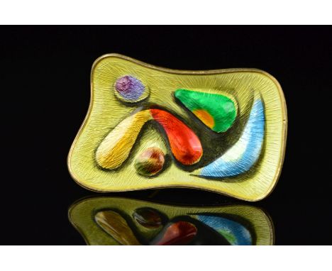 A NORWEGIAN ENAMEL BROOCH BY OYSTEIN BALLE, of curved rectangular outline, embossed with abstract shapes in various colours t