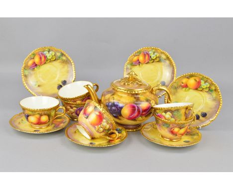 A ROYAL WORCESTER FRUIT STUDY PART TEASET, comprising teapot and cover, six tea cups and six saucers, all pieces with gilt ga