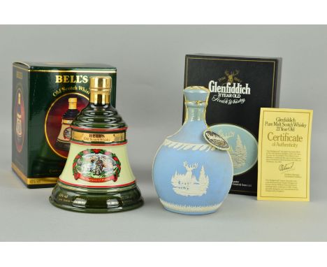 TWO CERAMIC DECANTERS OF WHISKY, comprising a 21 year old Glenfiddich Pure Malt, produced in 1987 in a Wedgwood decanter and 
