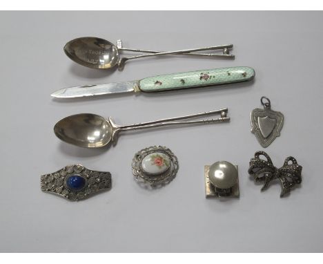 An Early XX Century Silver Bladed Penknife, the handle with guilloche enamel decorated with roses, other silver items includi