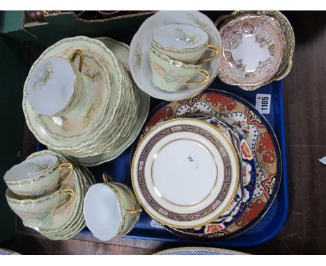 An Early XX Century Continental China Part Tea Service, decorated with forget-me-nots on a blush ivory and pale green ground 