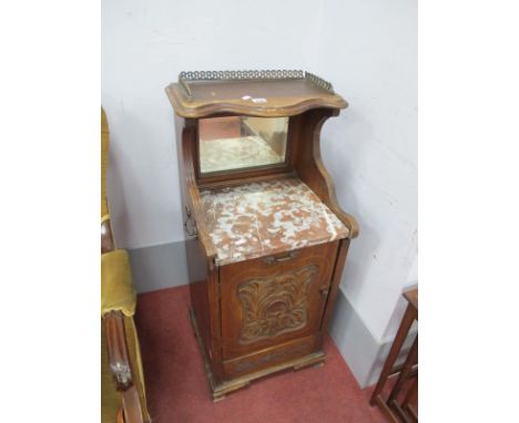 A Late XIX Century Walnut Bedside Cupboard, with gilt gallery to serpentine upper shelf over mirror, marble shelf over cupboa