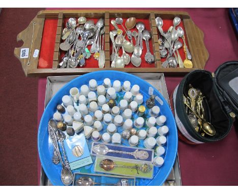 Thimbles - Mainly Ceramic, but silver and enamelled noticed; novelty spoons including 830 together with rack.