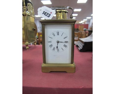 Brass Cased Carriage Clock, with black Roman numerals to white enamel dial, for Z. Barraclough of Leeds.