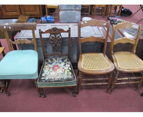 An Early XX Century Walnut Nursing Chair, with tapestry seat; a XIX Century Regency chair and two further chairs with caned s