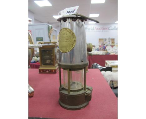 Miners Lamp Protector Lamp &amp; Lighting Co, with brass lower body , 24.5cm high with handle down.