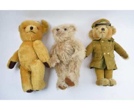 A collection of vintage teddy bears to include a Harrods bear, a Merrythought Barnados bear and a Nylena bear, the latter 2 w