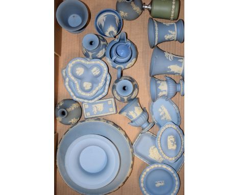 Wedgwood Jasperware in green and blue to include a large pedestal bowl, a table lighter, pin dishes and others (25 pieces app