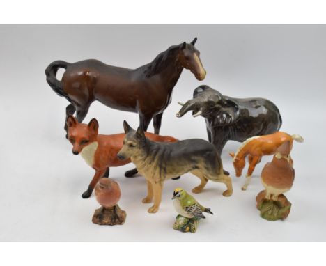 Beswick to include large standing fox 1016, brown swishtail (ear chipped), elephant (tusk af), a matt Cedar Waxwing (af), mat