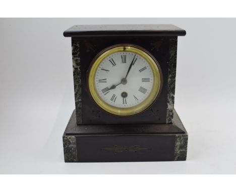 Late 19th / early 20th century slate mantle clock with pendulum and engraved decoration, 20.5cm tall, untested.  