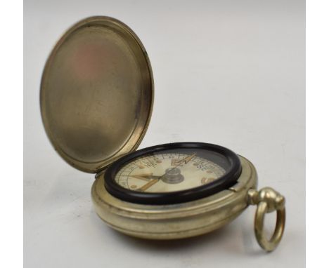 Military style pocket compass in nickel finish. Diameter 45mm.  In working order.