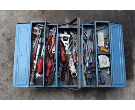 Vintage blue metal folding toolbox with contents of various tools and equipment.  