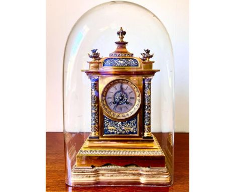 GOOD FRENCH QUALITY GILDED MANTLE CLOCK UPON SHAPED PLINTH WITH ACCOMPANYING GLASS DOME, LOW RELIEF PANELS AND COLUMNS, CIRCA