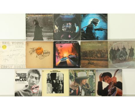 A collection of Neil Young And Bob Dylan LPs. Includes titles: Time Fades Away, Harvest, Zuma, The Times They Are A-changin',