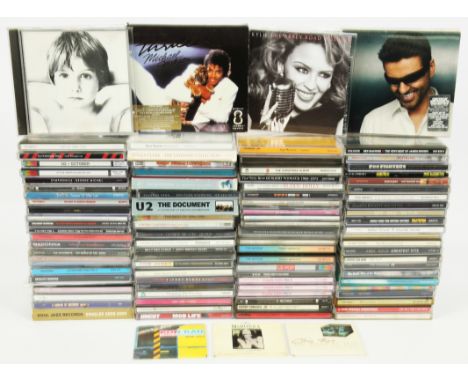 A collection of 80+ Pop And Rock CDs. Includes artists: U2, George Michael, Suzanne Vega, Madonna, Bjork, ABBA, Deee-lite, Ja