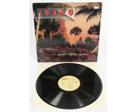 Debut album Year After Year by American Indie/Shoegaze band Idaho. Original 1993 UK/EU pressing. Light visible creases on sle