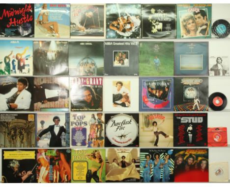 A collection of Assorted Pop LPs. Includes artists: Wham! Duran Duran, The Three Degrees, ABBA, Michael Jackson, OST from Gre