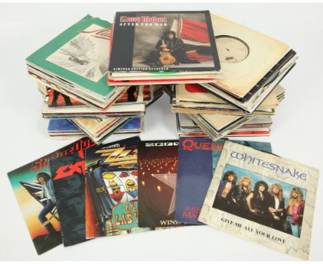 A collection of Rock 7" Singles. Includes artists: Rainbow, Whitesnake, John Lennon, Foreigner, Marc Bolan, Marillion, Twiste