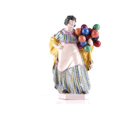 Charles Vyse (1882-1971), 'The Balloon Woman', earthenware figure, painted in colours, painted 'CV 1920, Chelsea' to base, 22