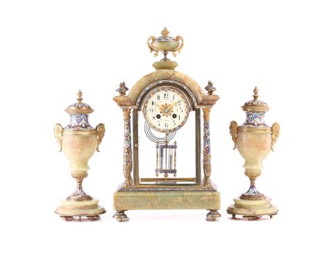 An early 20th-century French green onyx and champleve enamel 8-day clock garniture, the clock with urn finial and the arched 